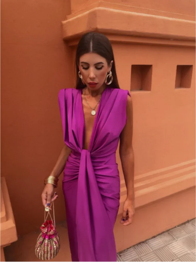 V-hals jurk met knoopdetail