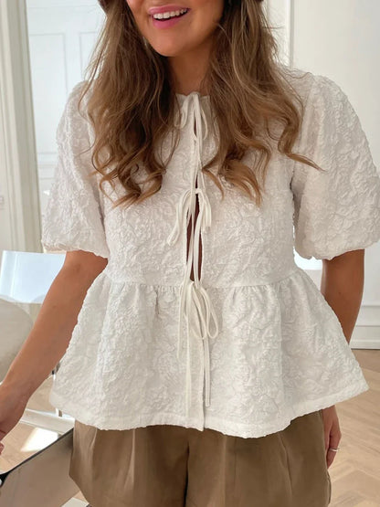 Blouse met textuur en strik